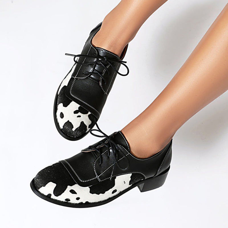 NICKI COWPRINT LOAFERS