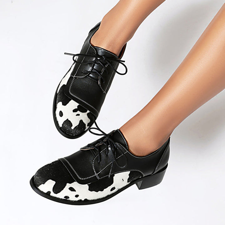 NICKI COWPRINT LOAFERS