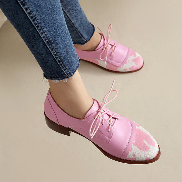 NICKI COWPRINT LOAFERS