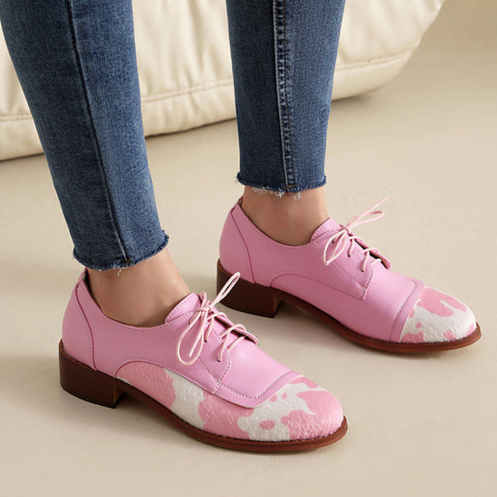 NICKI COWPRINT LOAFERS