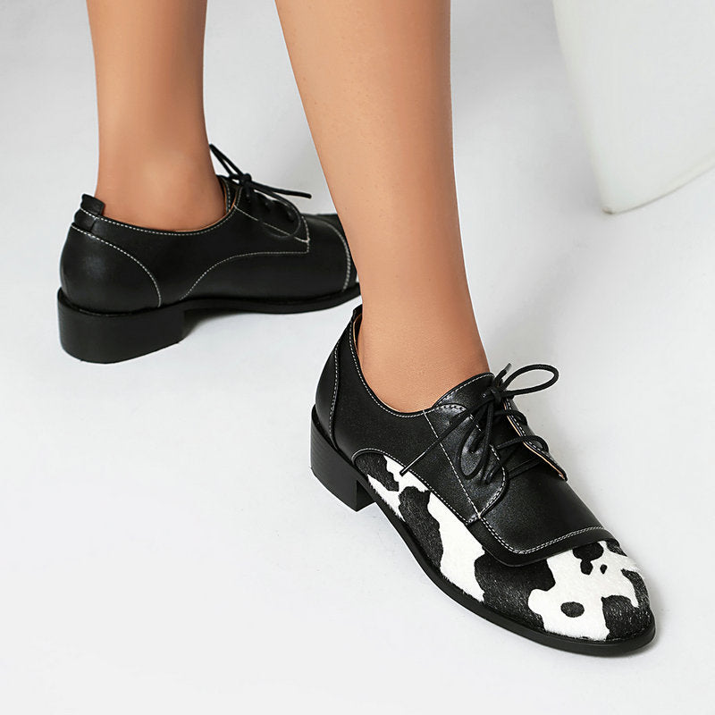 NICKI COWPRINT LOAFERS